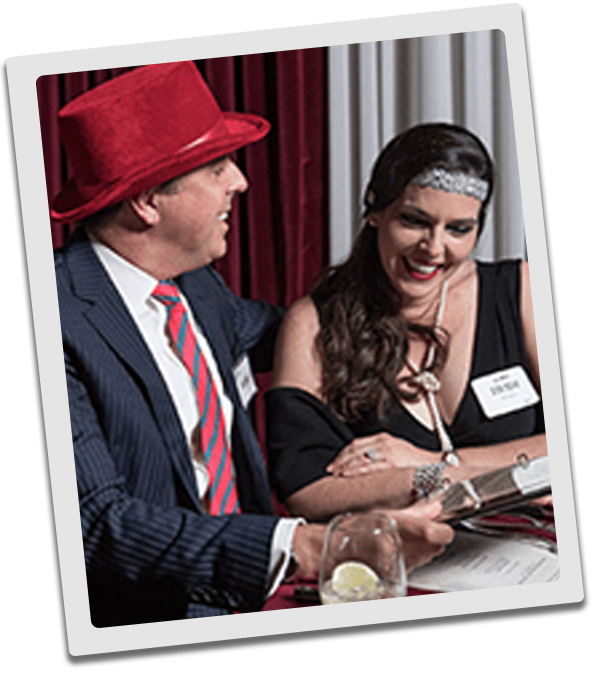 Minneapolis Murder Mystery couple checking out the dinner menu